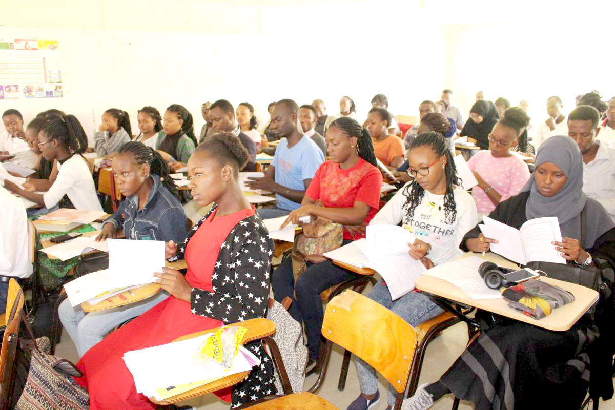 Students follow proceedings during the induction.