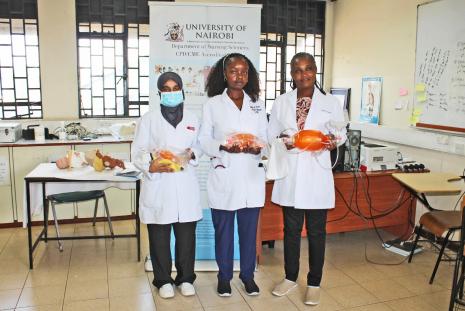 Simulation Nurse, Edith Mugane with medical students posing with the donated Ambu bags.